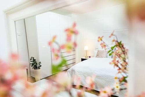 Postel nebo postele na pokoji v ubytování Charmante Wohnung in Koblenzer Innenstadt