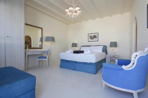 Ένα ή περισσότερα κρεβάτια σε δωμάτιο στο Blue Studio at Cavo Delos