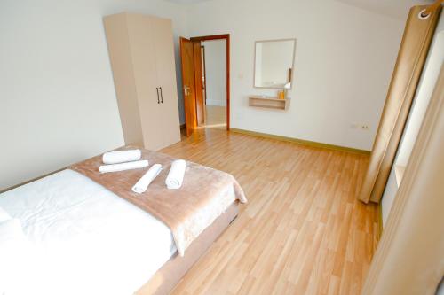 Postel nebo postele na pokoji v ubytování Urban Escape Guesthouse