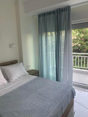 Ένα ή περισσότερα κρεβάτια σε δωμάτιο στο Casa di Evi sul mare Chaniotis
