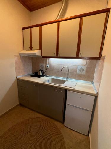 Kuchyň nebo kuchyňský kout v ubytování AB Apartments
