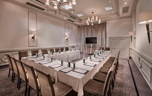 a conference room with a long table and chairs at Labourdonnais Waterfront Hotel in Port Louis