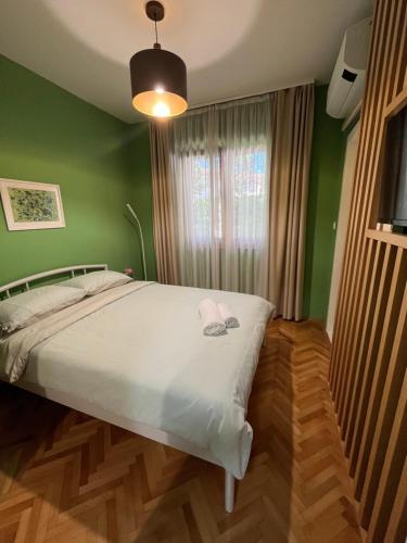 Postel nebo postele na pokoji v ubytování Old Niksic M