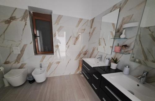 Koupelna v ubytování Vila Vokopola