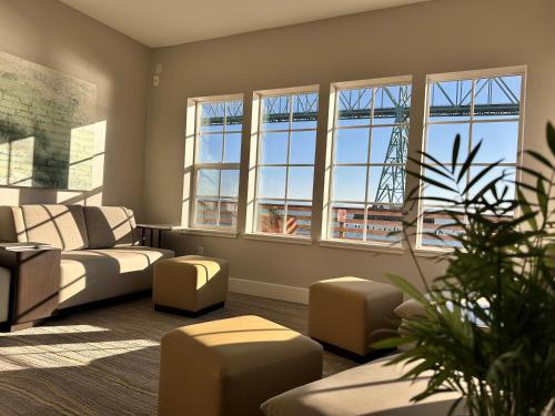 a living room with a view of the eiffel tower at Cannery Pier Hotel & Spa in Astoria, Oregon