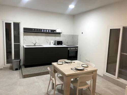 Cuisine ou kitchenette dans l'établissement Floriana Cosy Corner