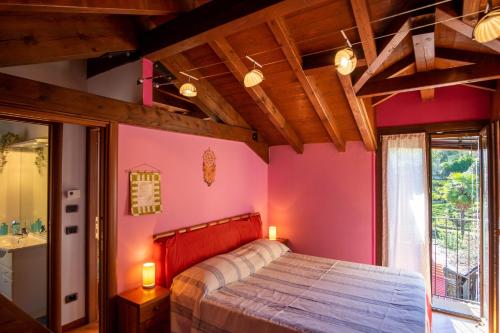 Ένα ή περισσότερα κρεβάτια σε δωμάτιο στο Zanone Enea