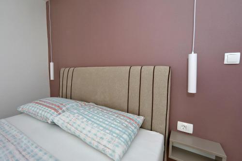 Katil atau katil-katil dalam bilik di Luxury apartman Gino