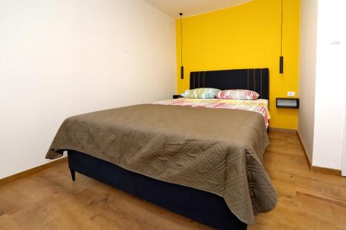Katil atau katil-katil dalam bilik di Luxury apartman Gino