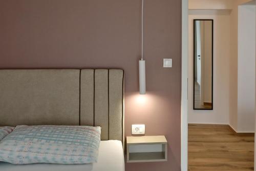Katil atau katil-katil dalam bilik di Luxury apartman Gino
