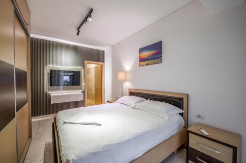 Katil atau katil-katil dalam bilik di Mato Luxury Apartments