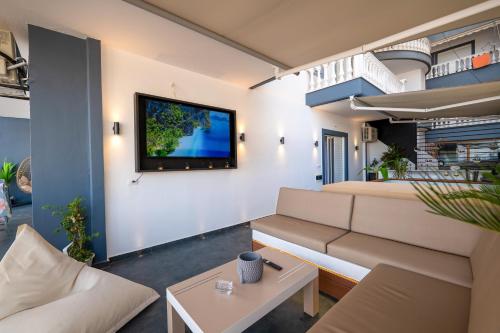 Televisyen dan/atau pusat hiburan di Mato Luxury Apartments