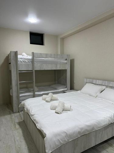Postel nebo postele na pokoji v ubytování Cottage V1
