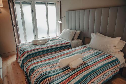 Voodi või voodid majutusasutuse BRACKEN BARN at Sunny Brow Farm toas