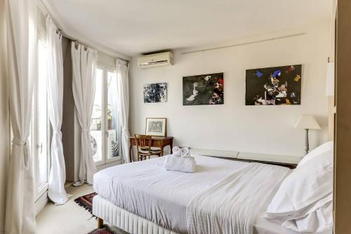 Photo de la galerie de l'établissement GuestReady - French Flair Rooftop Hideaway, à Paris