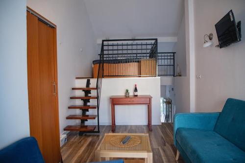 Una televisión o centro de entretenimiento en FOR-A Apartmani