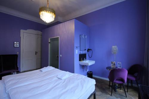 Ένα ή περισσότερα κρεβάτια σε δωμάτιο στο ArtHotel Connection