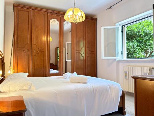 Postel nebo postele na pokoji v ubytování Mare, Monti e Limoni