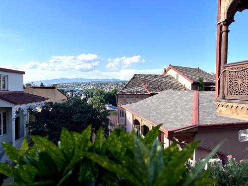 a view of roofs of buildings in a city at Betlemi Old Town Hotel in Tbilisi City
