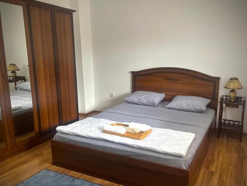 Postel nebo postele na pokoji v ubytování AS apartment house
