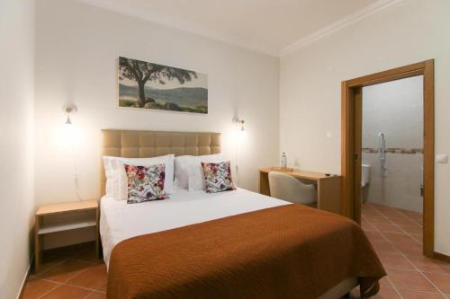 Ένα ή περισσότερα κρεβάτια σε δωμάτιο στο Casa dos Lacerdas