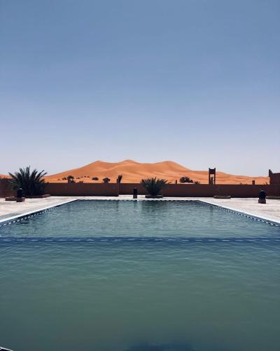 Πισίνα στο ή κοντά στο Hotel Camping Les Roses Des Dunes & Piscine