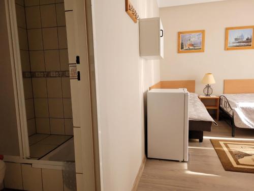 Kuchyň nebo kuchyňský kout v ubytování Villa Pod Dębem