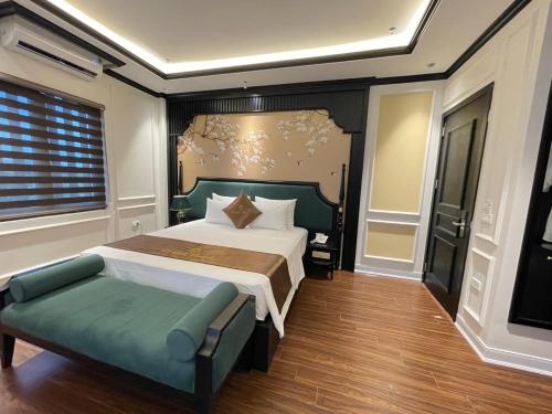 Ένα ή περισσότερα κρεβάτια σε δωμάτιο στο Grand Ha Noi Hotel