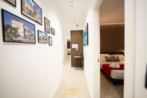 Katil atau katil-katil dalam bilik di Sicily Luxury Rooms