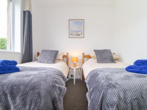 Ένα ή περισσότερα κρεβάτια σε δωμάτιο στο Small Hillman