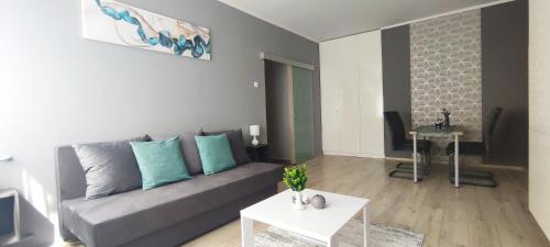 Posezení v ubytování Grey Deluxe Apartman Kaposvár