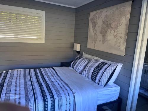 Ένα ή περισσότερα κρεβάτια σε δωμάτιο στο TeePee Room 16-Newly Renovated