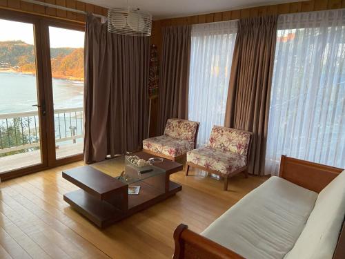 オソルノにあるCabaña Maicolpue Rio Surのギャラリーの写真