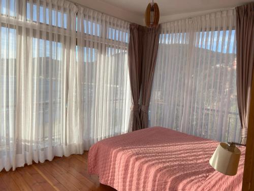 Ένα ή περισσότερα κρεβάτια σε δωμάτιο στο Cabaña Maicolpue Rio Sur