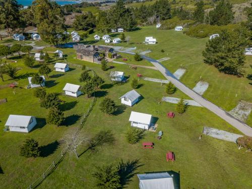 an aerial view of a group of tents in a field at Costanoa in Pescadero