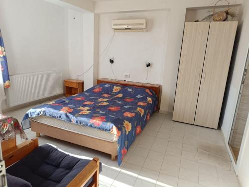 Postel nebo postele na pokoji v ubytování Eli Guest House
