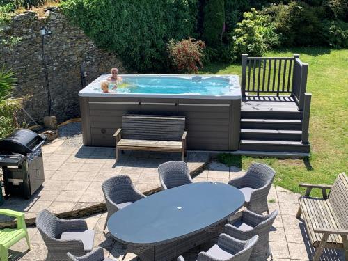 The swimming pool at or close to Polean Farm Cottages - With Free Animal Feeding and Pony Rides and Free Access to a Nearby Pool