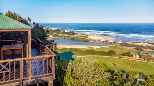 a resort with a view of the ocean at Peak's Cabin - Endless Ocean Views - Fireplace - Fast WiFi in Wilderness