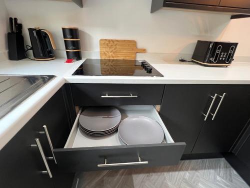 Kuchyň nebo kuchyňský kout v ubytování Stylish Flat in London