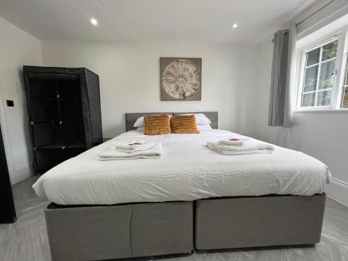 Postel nebo postele na pokoji v ubytování Stylish Flat in London