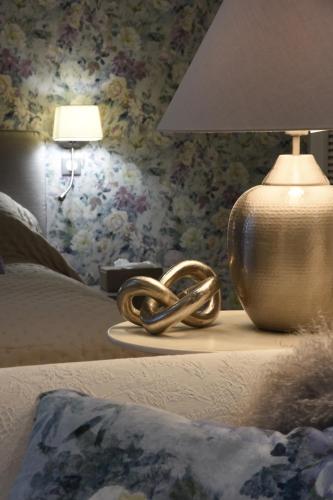 Ein Bett oder Betten in einem Zimmer der Unterkunft Girauderies Chambres d'Hotes/B+B
