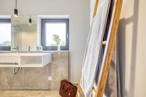 Ένα μπάνιο στο Ferienhaus Peak ONE