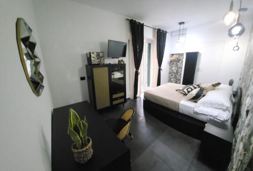 Ένα ή περισσότερα κρεβάτια σε δωμάτιο στο B&B Central Vasto con noleggio bici