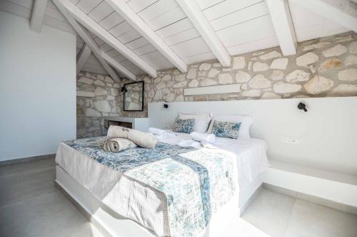 Кровать или кровати в номере Villa Maria Vasilikos