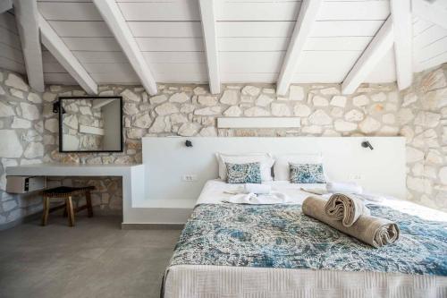 Кровать или кровати в номере Villa Maria Vasilikos