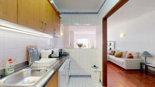 Η κουζίνα ή μικρή κουζίνα στο Apartamento CPiscina-Albufeira