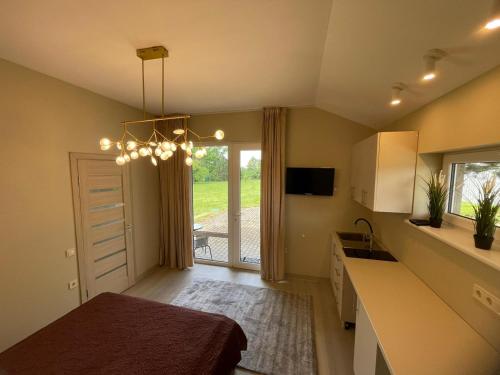 Kuchyň nebo kuchyňský kout v ubytování Beach Guesthouse Lenkas