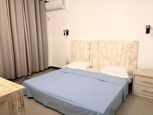 Postel nebo postele na pokoji v ubytování Ebony Apartment & Studio