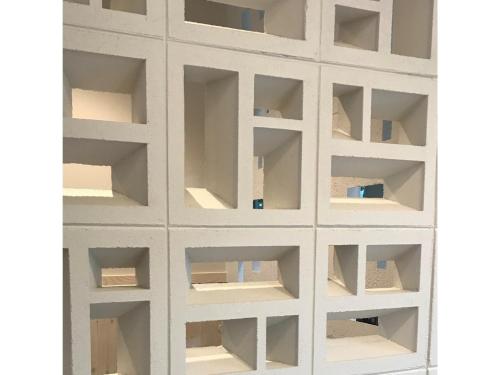 a white wall with lots of open shelves at Hotel Sunset Hill - Vacation STAY 94797v in Nakadomari