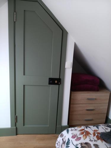 Postel nebo postele na pokoji v ubytování Rose Cottage